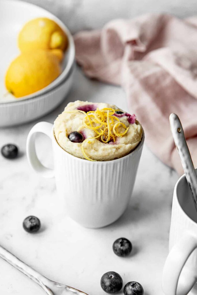 Blueberry Mug Cake Recipe With Lemon Glaze - Swirls of Flavor